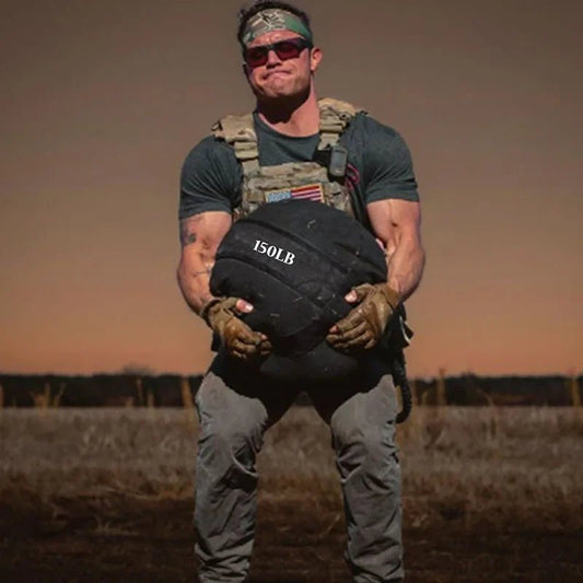 Sacs de sable d entrainement physique par un homme