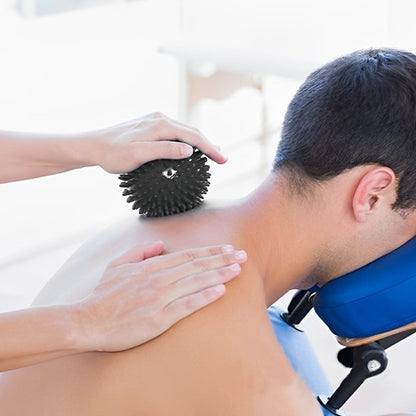 ballon de gym homme tension dos massage