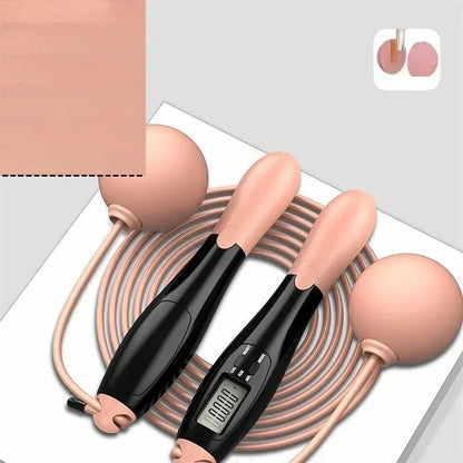 corde a sauter sans corde rose et noire  corde et boules lestees