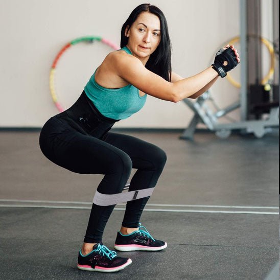 elastique pour le sport femme faisant quat avec bande
