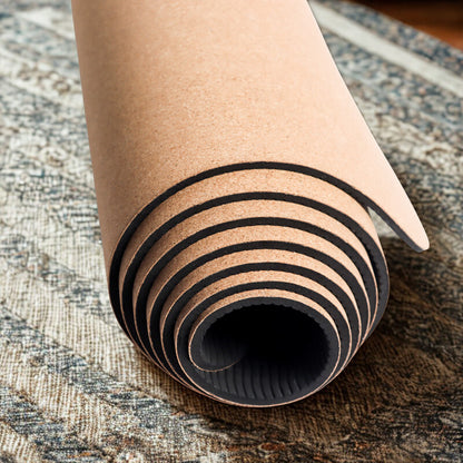 tapis pour pilates enroulé sur table épaisseur 6 mm